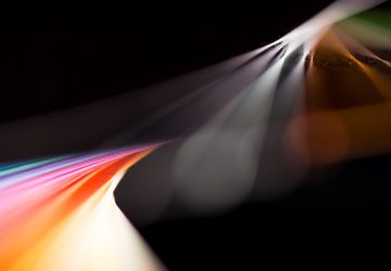 composition of colorful papers isolated on black