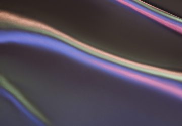 dark violet and pink shiny silk fabric background
