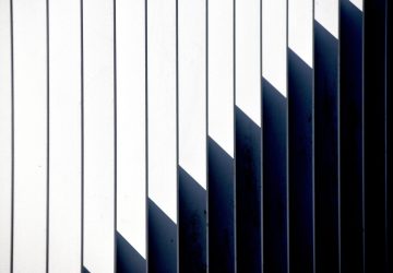 light-and-shadow-play-on-some-iron-railings-2026-01-08-00-30-24-utc-scaled